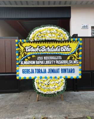 Papan Bunga Duka di Tampahan